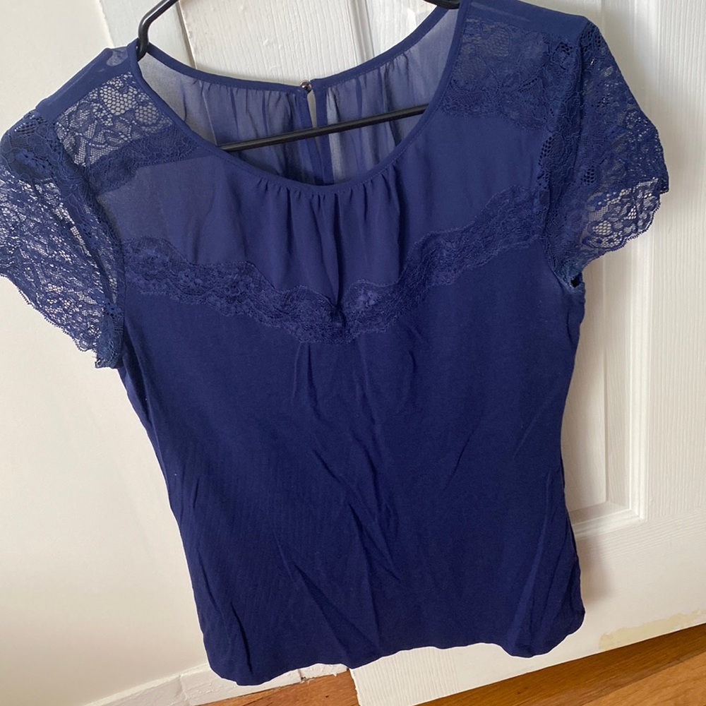 Womens express lace and sheer detail navy top, back button closure. Medium.